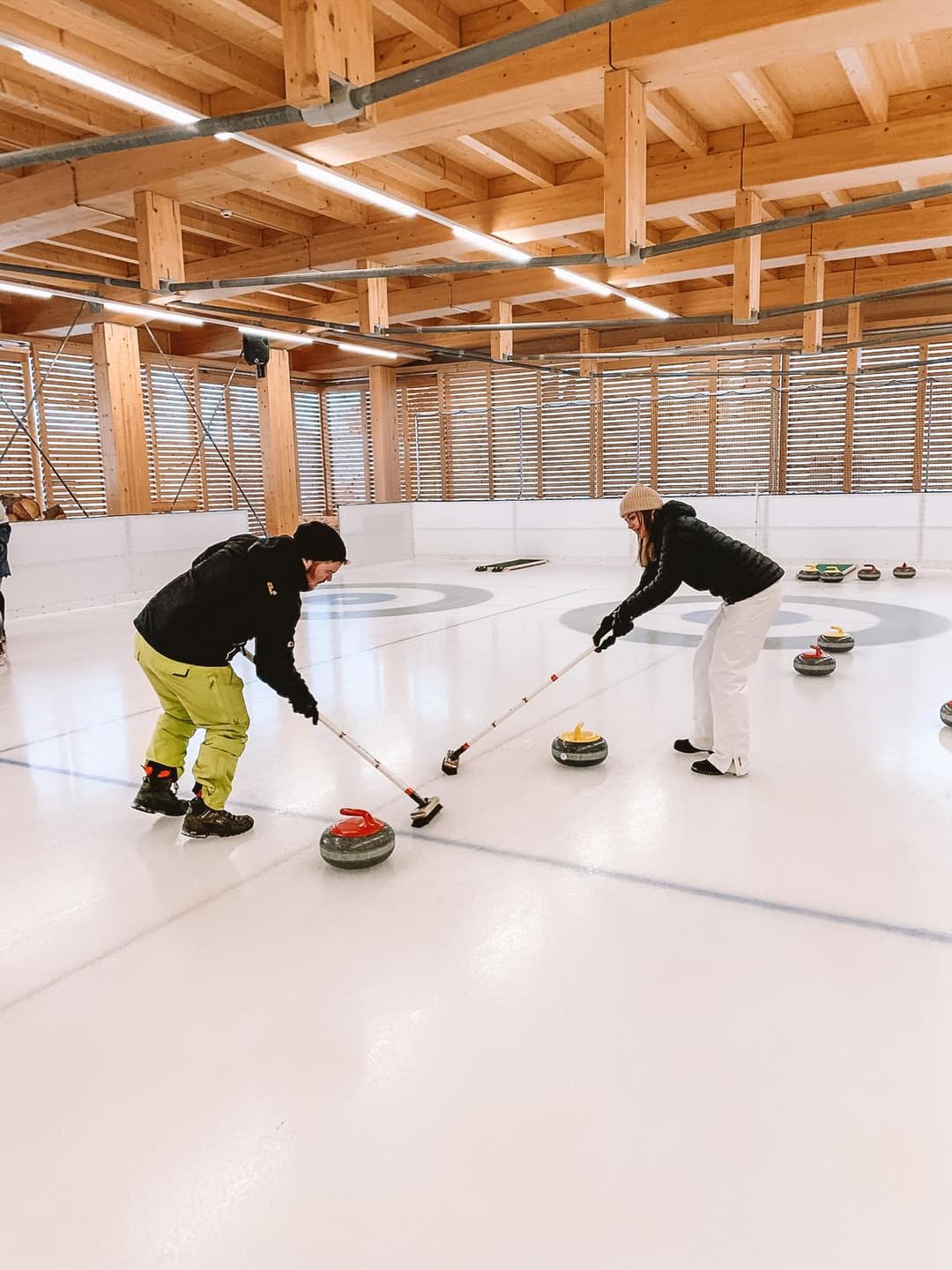 Kandahar Ski Club members curling at a winter club gathering